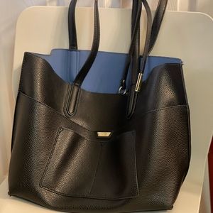 Black leather tote/shoulder bag.